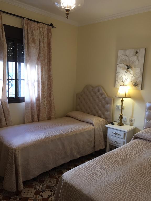 Hostal Lojo Кониль-де-ла-Фронтера Номер фото